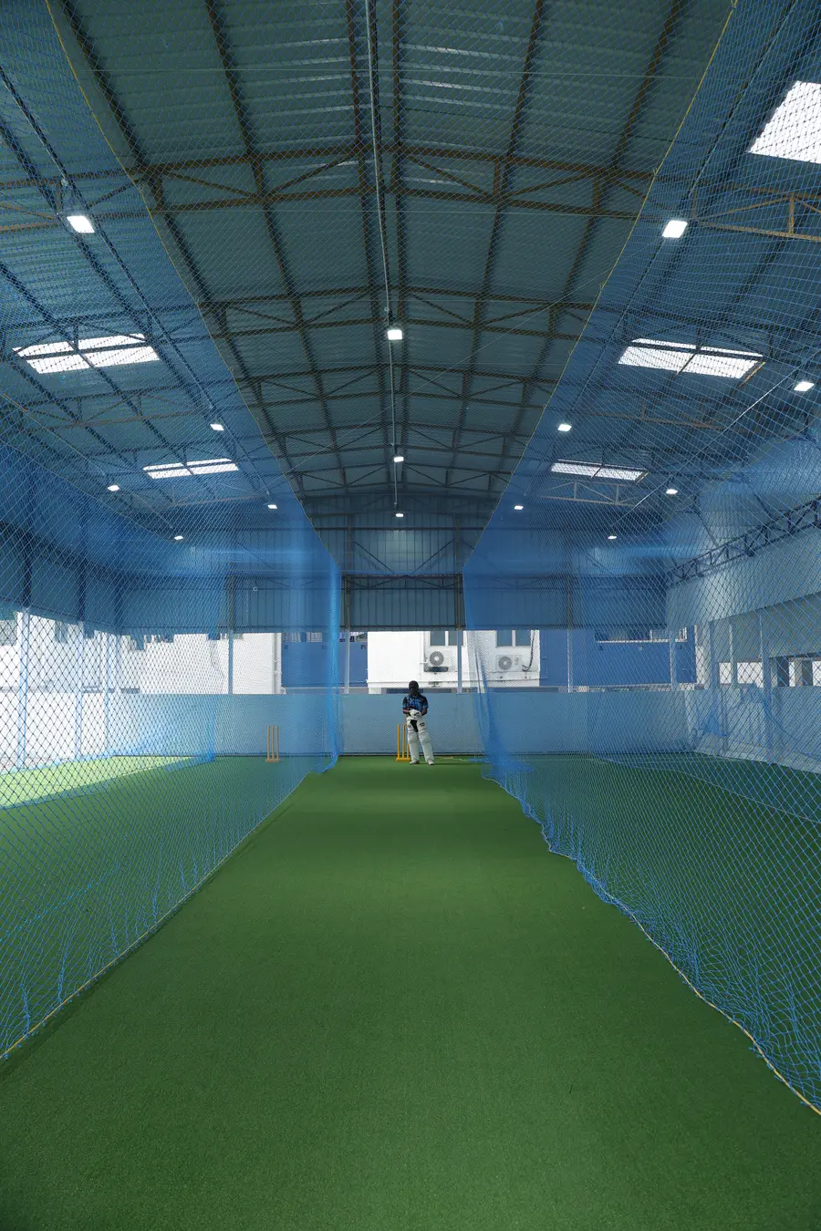 A netted lane under skylights